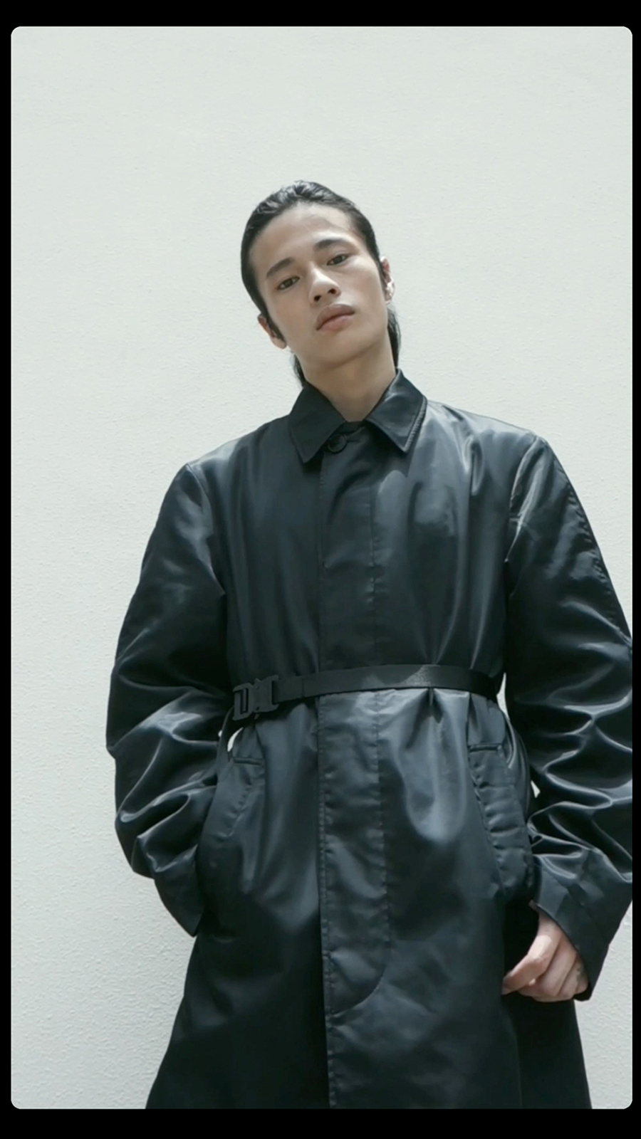 Ron Wan with 1017 ALYX 9SM black trench coat online only at I.T eSHOP.