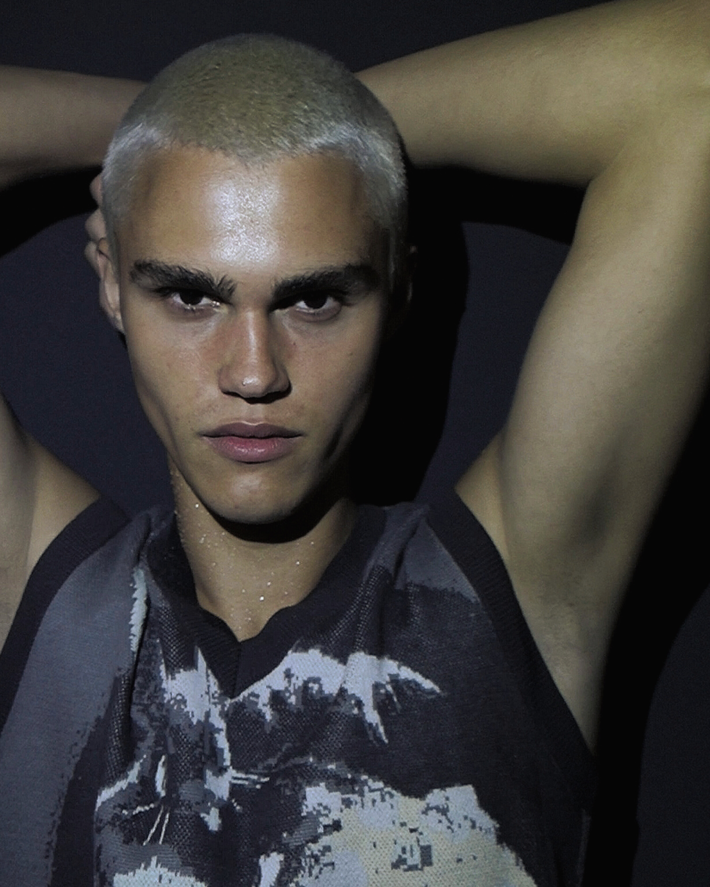 Ron Wan with Roma Birsan with Hunters Agency, Modelwerk, and Tank. Photographed in Hong Kong.