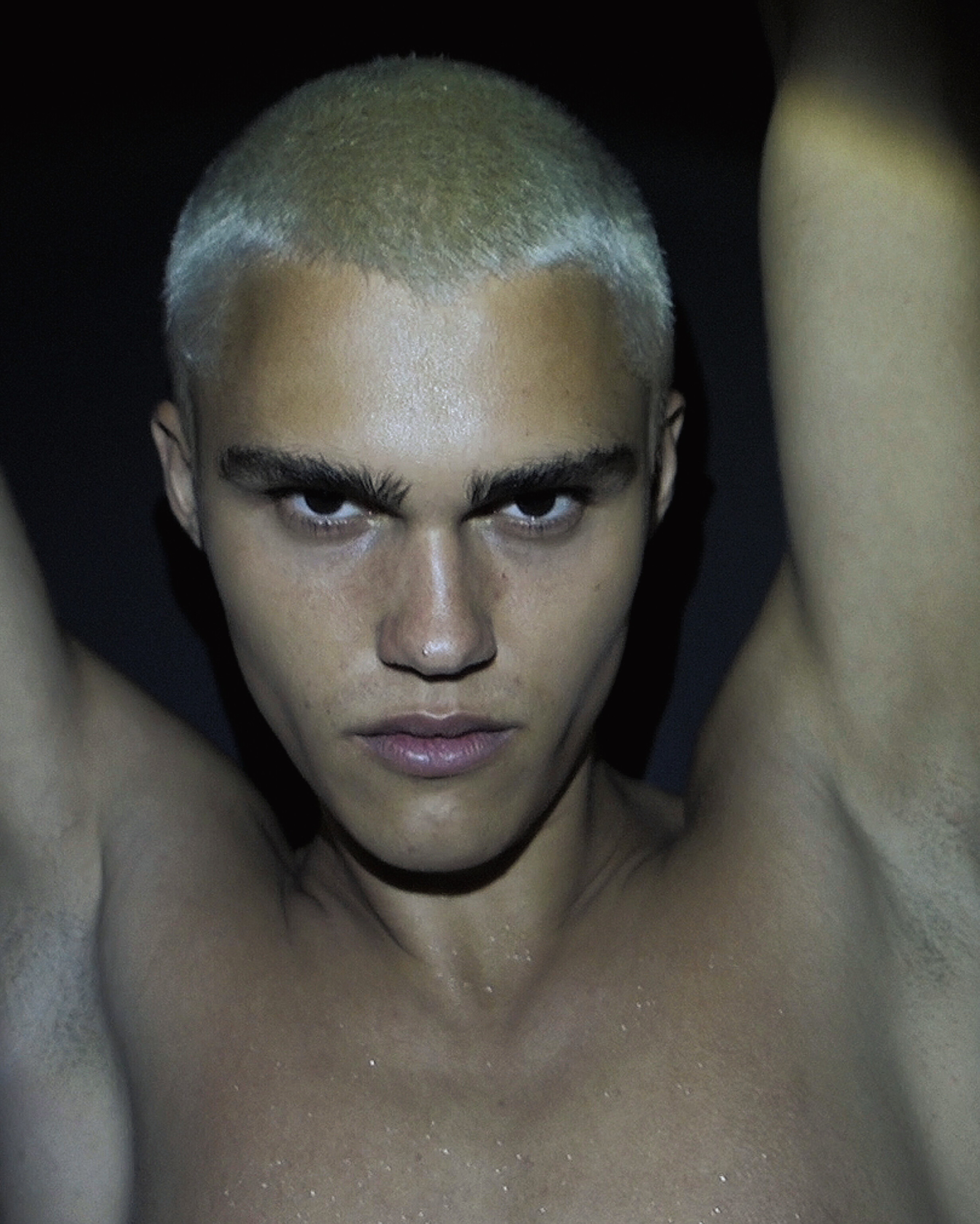 Ron Wan with Roma Birsan with Hunters Agency, Modelwerk, and Tank. Photographed in Hong Kong.