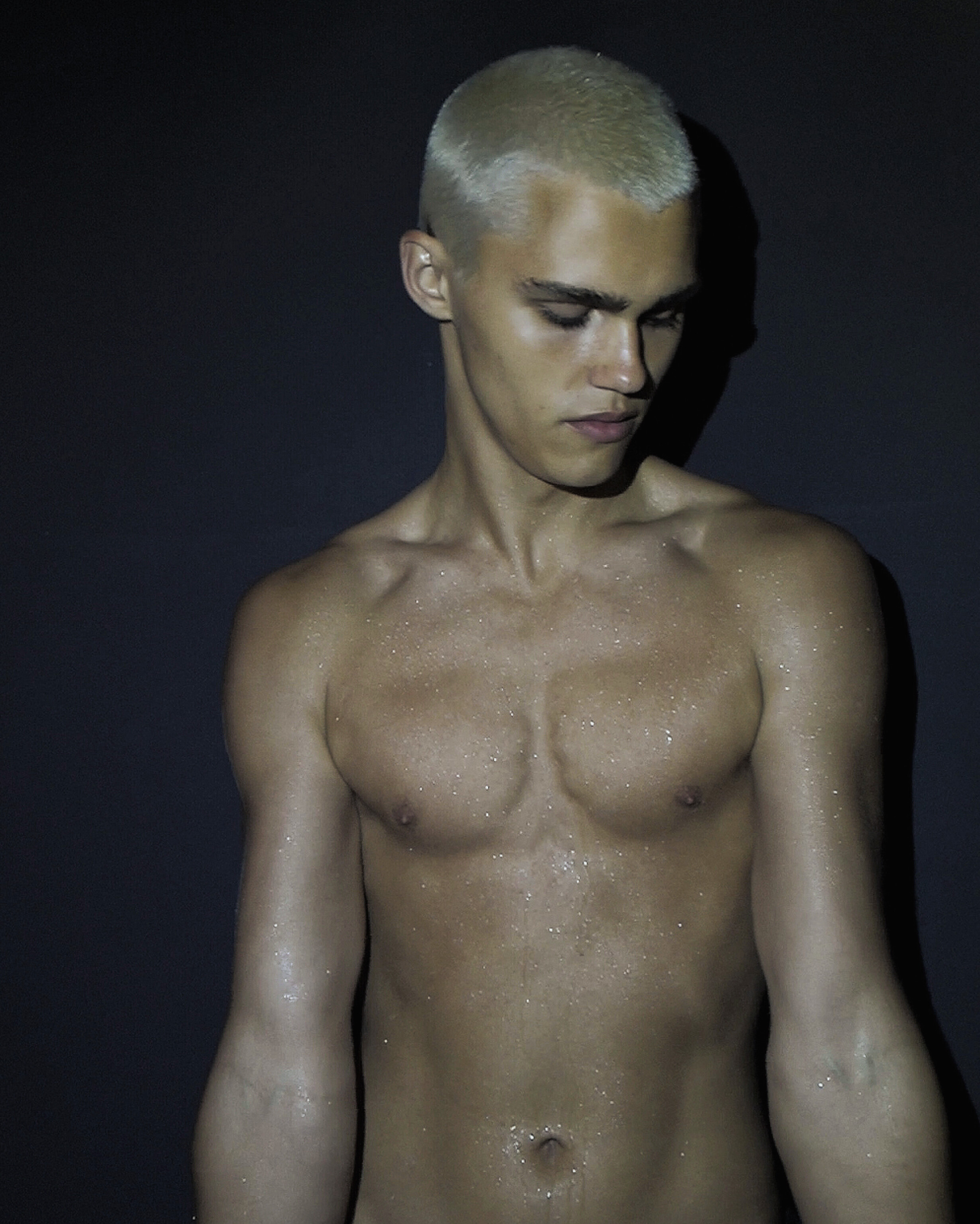 Ron Wan with Roma Birsan with Hunters Agency, Modelwerk, and Tank. Photographed in Hong Kong.