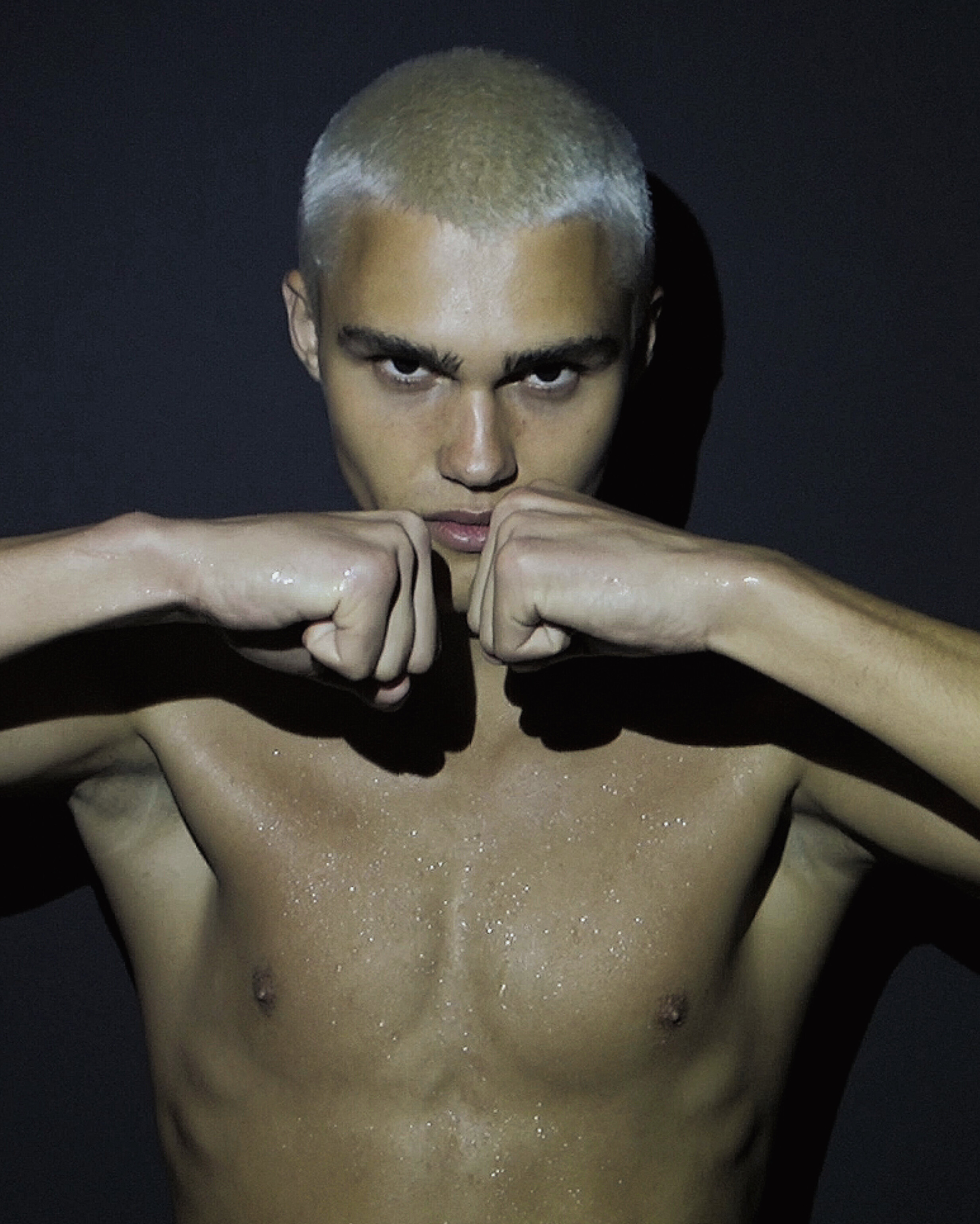 Ron Wan with Roma Birsan with Hunters Agency, Modelwerk, and Tank. Photographed in Hong Kong.