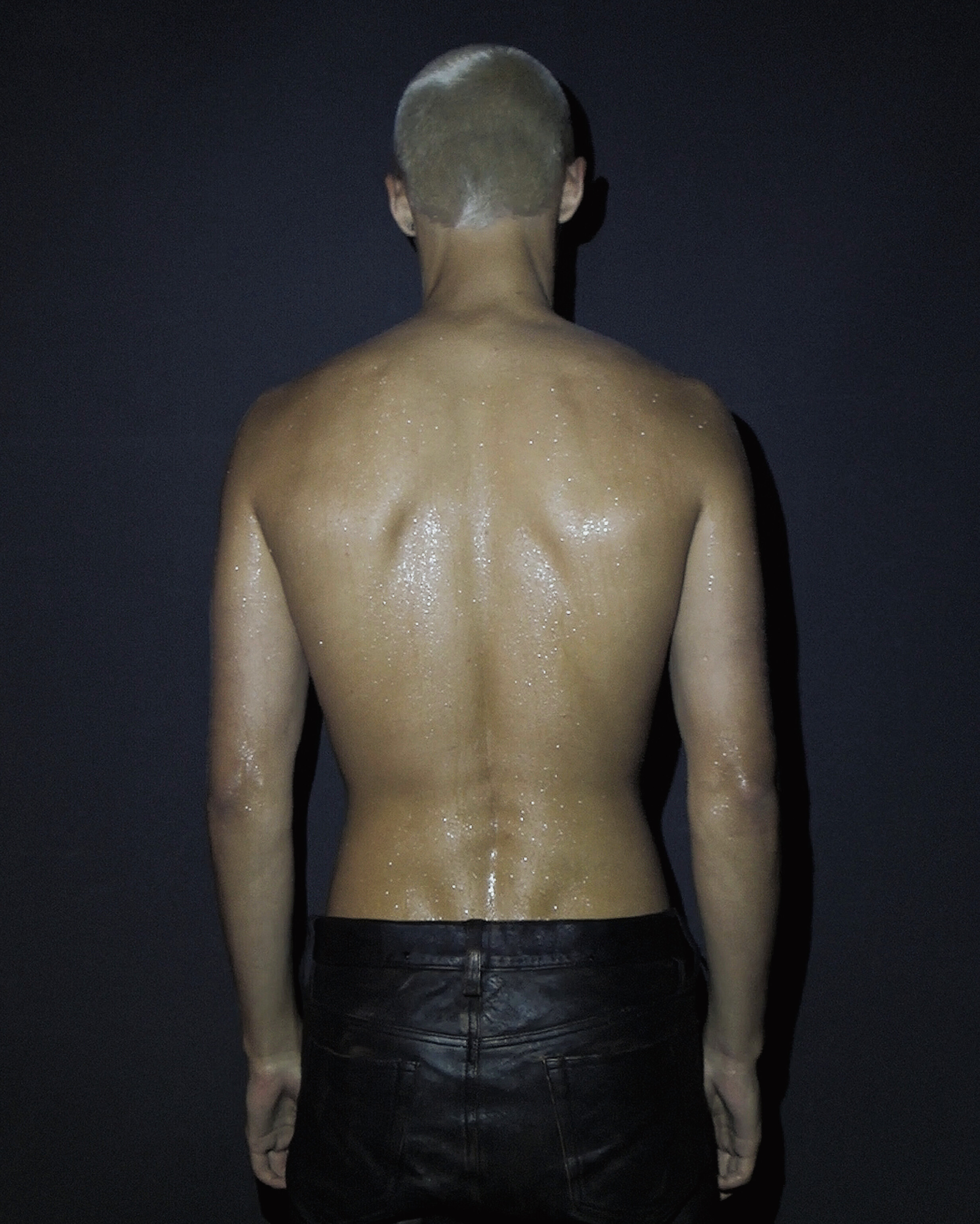 Ron Wan with Roma Birsan with Hunters Agency, Modelwerk, and Tank. Photographed in Hong Kong.