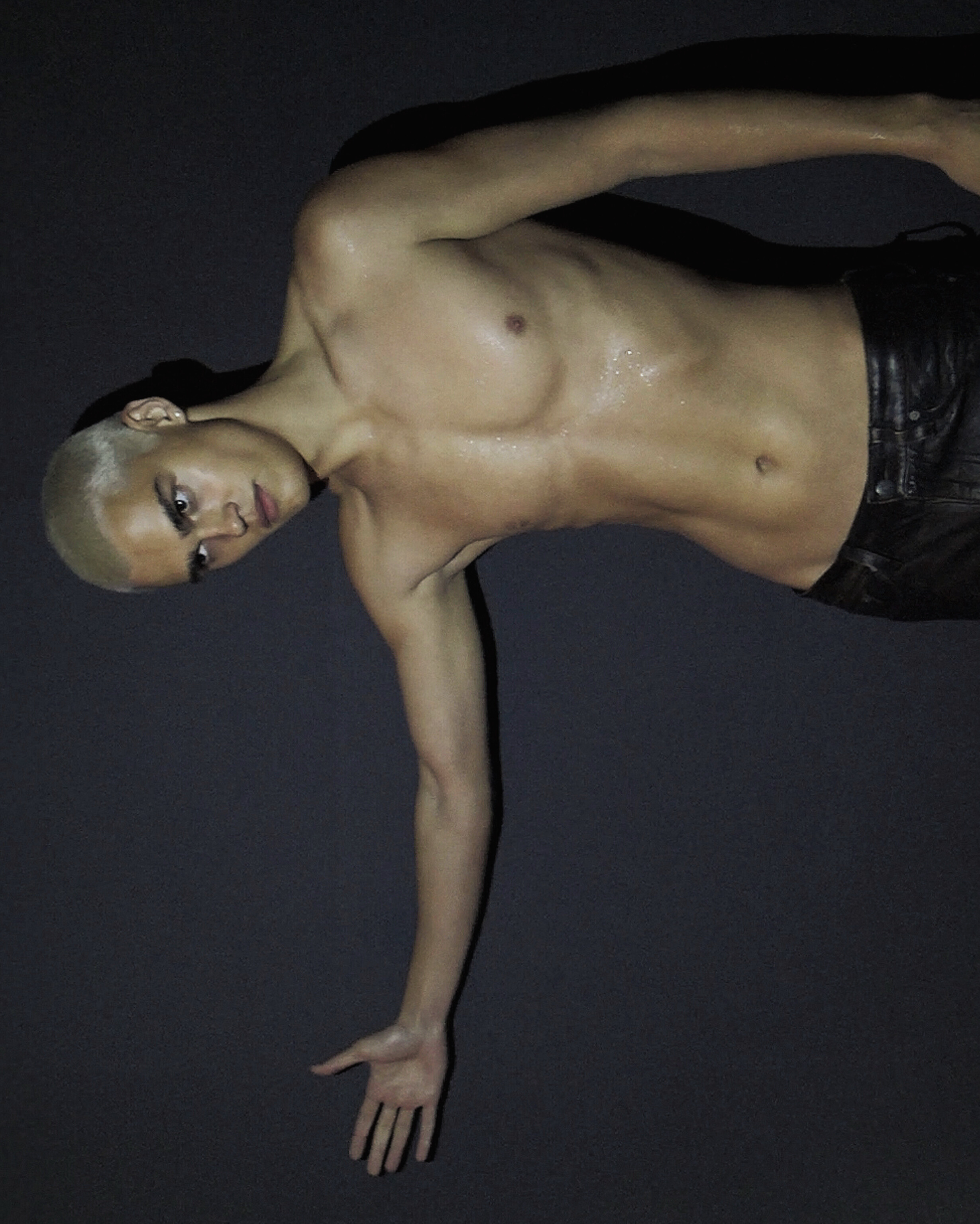Ron Wan with Roma Birsan with Hunters Agency, Modelwerk, and Tank. Photographed in Hong Kong.