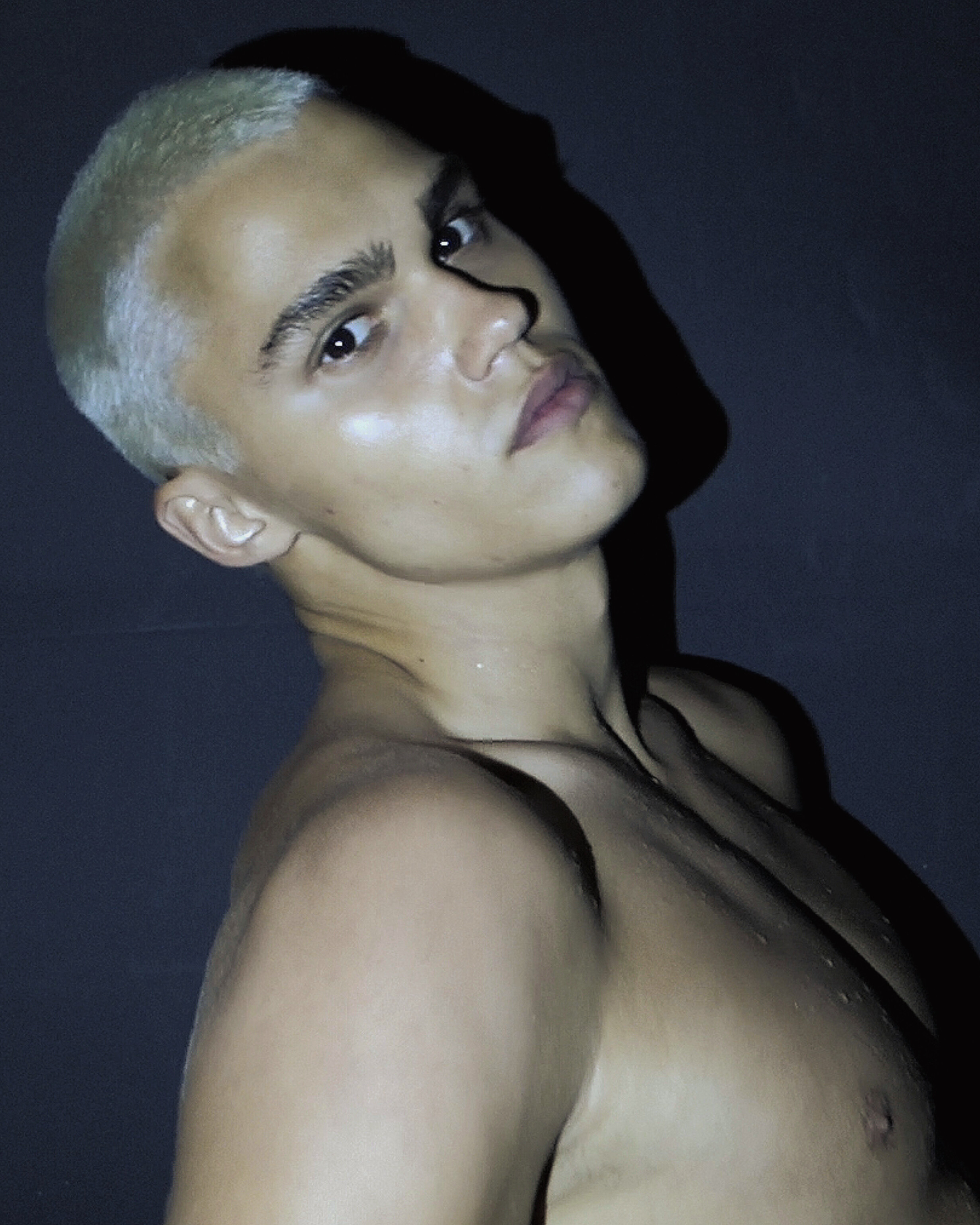 Ron Wan with Roma Birsan with Hunters Agency, Modelwerk, and Tank. Photographed in Hong Kong.