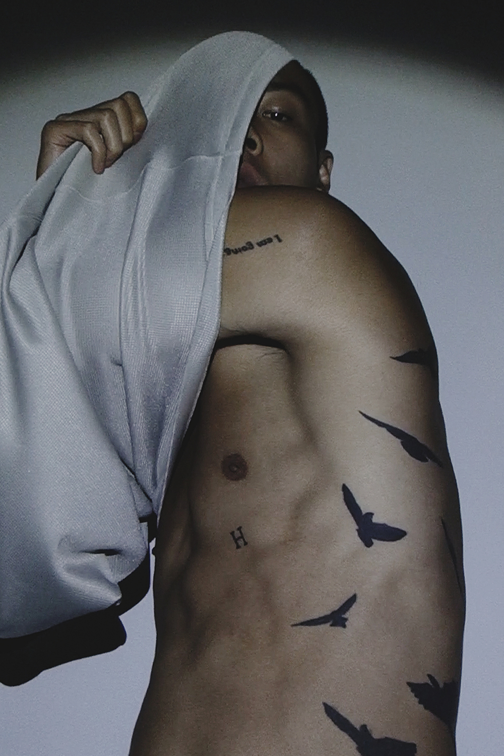 Ron Wan with model Jonathon Wong in Karmuel Young