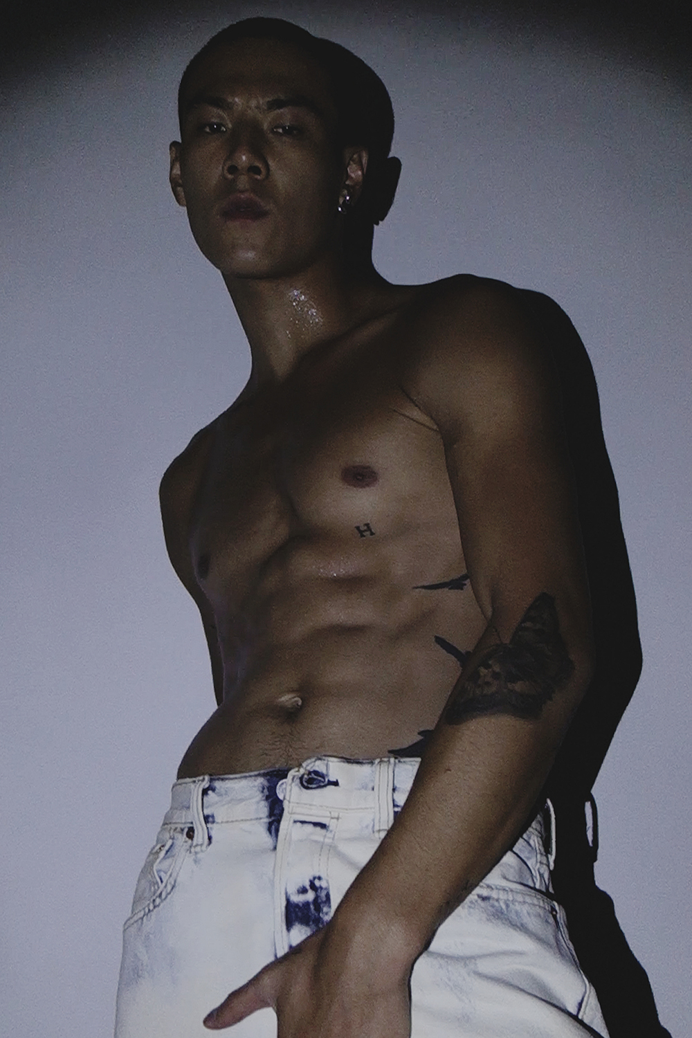 Ron Wan with model Jonathon Wong in Karmuel Young